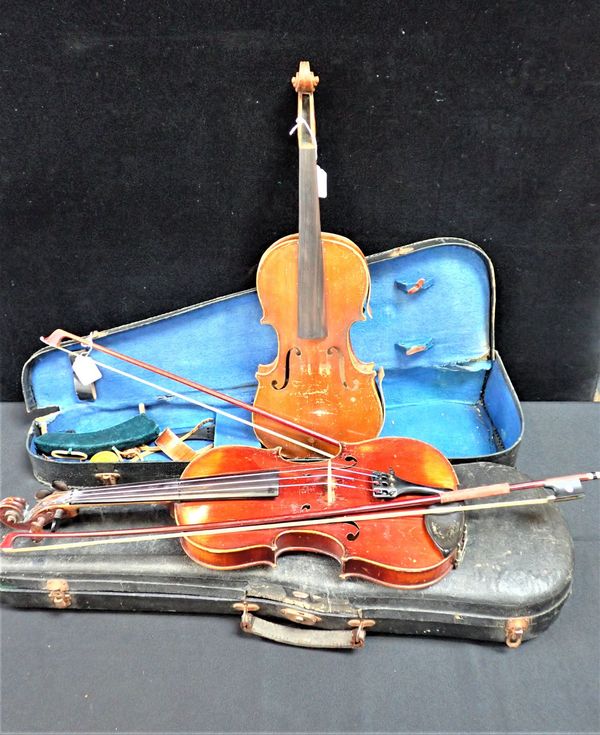 A CASED VIOLIN WITH BOW