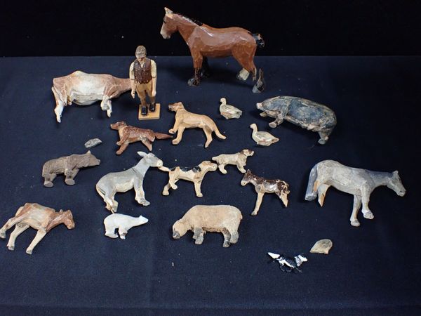 A CARVED WOODEN FARMYARD GROUP, WITH FARMER