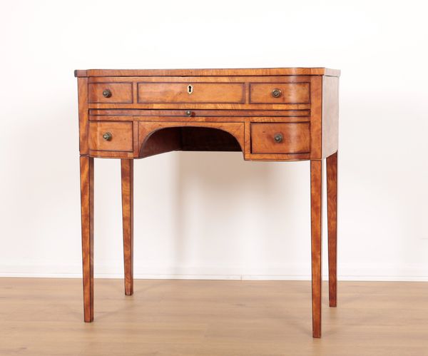 A GEORGE III SATINWOOD BOWFRONT WRITING DESK