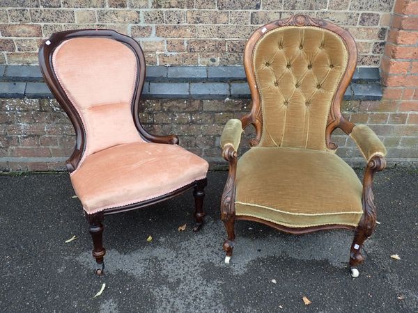 A VICTORIAN OPEN ARMCHAIR WITH CARVED FRAME