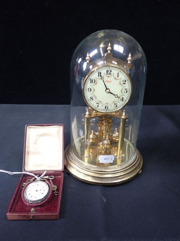 AN ANNIVERSARY CLOCK WITH A DOME