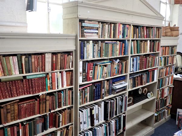 A LARGE BREAKFRONT OPEN BOOKCASE