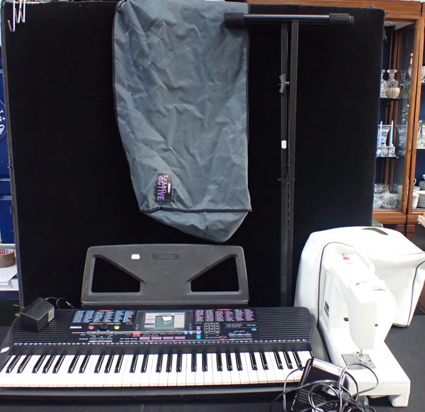 A JANOME 110 SEWING MACHINE, AND YAMAHA PSR 220 KEYBOARD