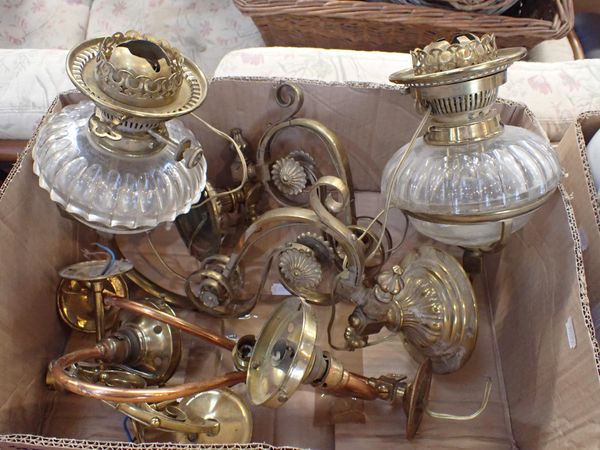 A FINE PAIR OF CUT GLASS OIL LAMPS ON WALL BRACKETS