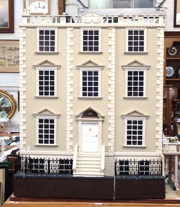 A LARGE FULLY FURNISHED  FOUR-STOREY DOLLS HOUSE