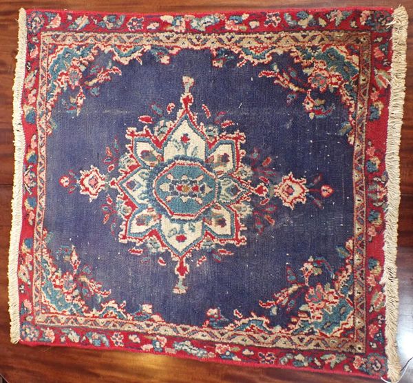 A SMALL HAMADAN SQUARE RUG