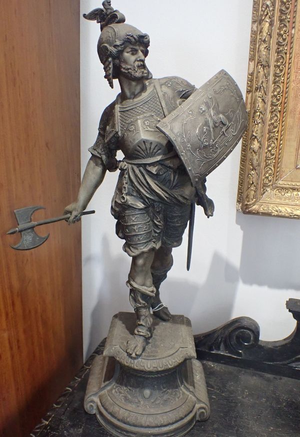 A 19TH CENTURY WEATHERED SPELTER FIGURE OF A WARRIOR