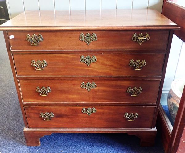 A GEORGE III MAHOGANY CHEST OF FOUR DRAWERS