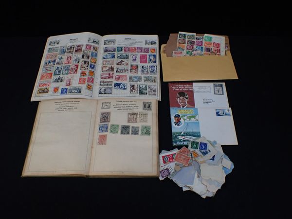 TWO STAMP ALBUMS AND A QUANTITY OF LOOSE STAMPS