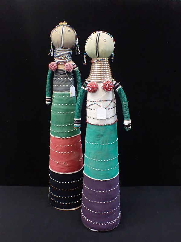 TWO AFRICAN DECORATIVE CLOTH AND BEADWORK FIGURES