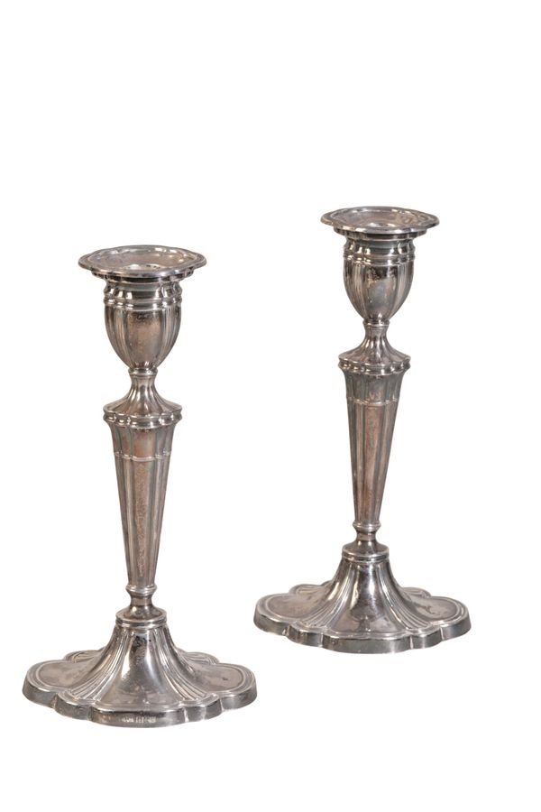 A PAIR OF QUEEN ELIZABETH II SILVER CANDLESTICKS