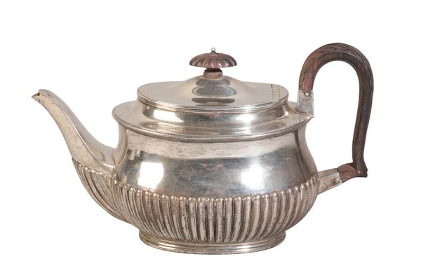 A VICTORIAN SILVER TEAPOT