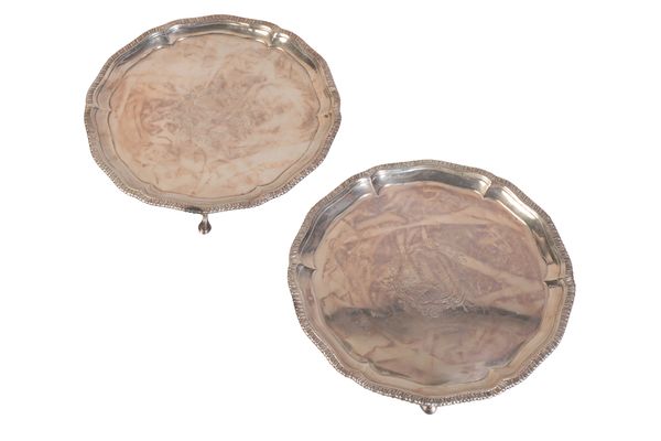 A PAIR GEORGE III WHITE METAL SALVERS