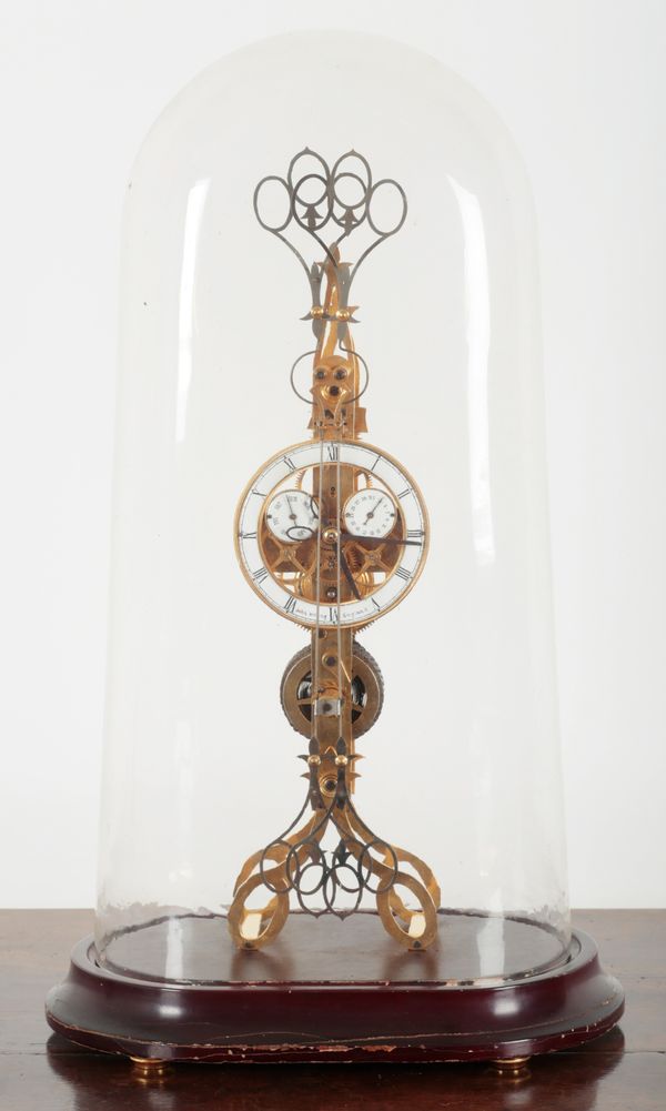 AN ENGLISH BRASS SCISSOR ACTION SKELETON CLOCK BY JOHN WILDING