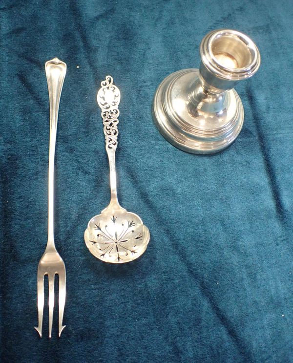 A QUEEN ELIZABETH II SILVER SQUAT CANDLESTICK