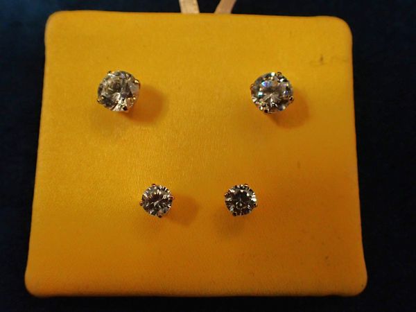 TWO PAIRS OF CUBIC ZIRCONIA STUD EARRINGS