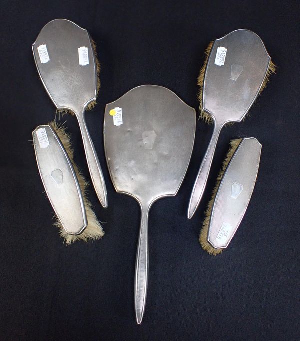 A FIVE PIECE SILVER HAIRBRUSH SET