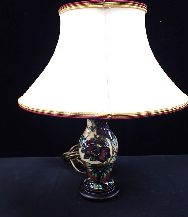 A MOORCROFT HELLEBORE TABLE LAMP AND SHADE