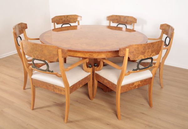 A REGENCY STYLE BURR WALNUT AND OAK DINING SUITE