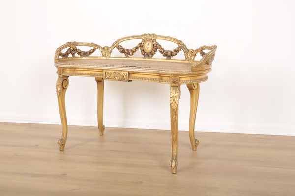 A LOUIS XVI STYLE GILTWOOD HALL SEAT