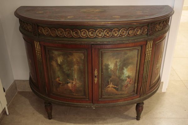 A LOUIS XVI STYLE SATINWOOD AND POLYCHROME BOWFRONT SIDEBOARD