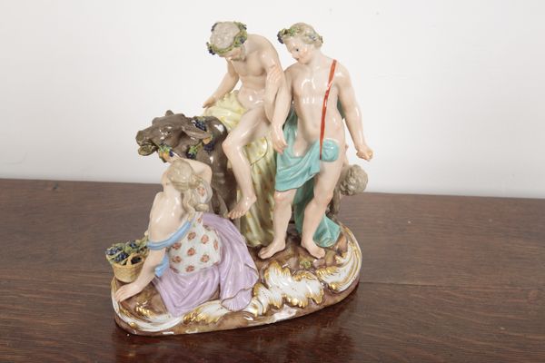 A MEISSEN PORCELAIN FIGURE OF BACCHUS