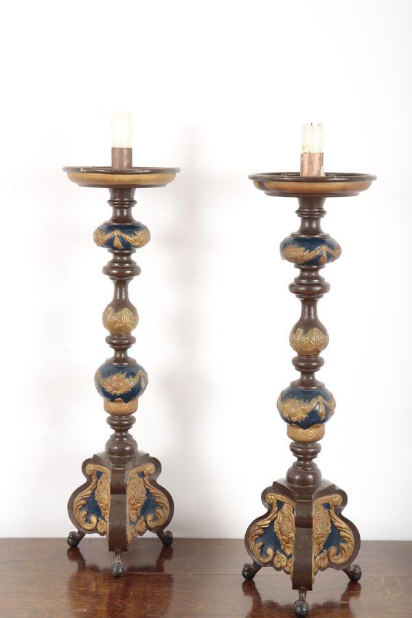 A PAIR OF BAROQUE STYLE PAINTED CANDLESTICKS