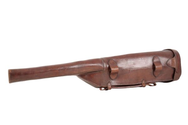 A VICTORIAN BROWN LEATHER GUN CASE