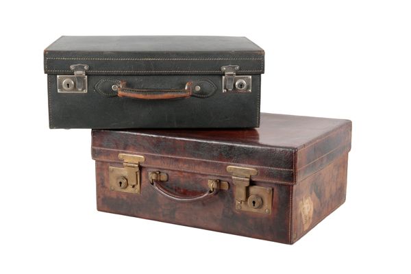 AN EDWARDIAN BROWN LEATHER VANTITY CASE