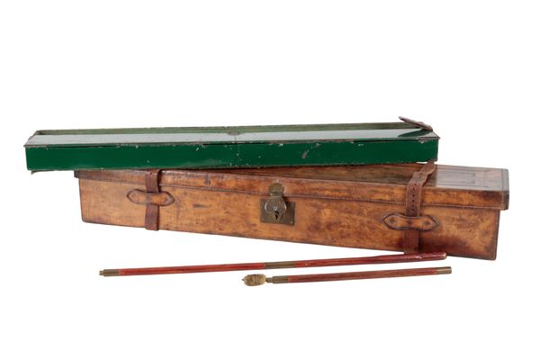 HUGH SNOWIE OF INVERNESS: A BROWN LEATHER SINGLE GUN CASE