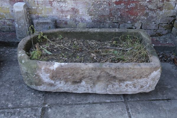 A LARGE STONE TROUGH