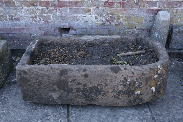 A LARGE STONE TROUGH