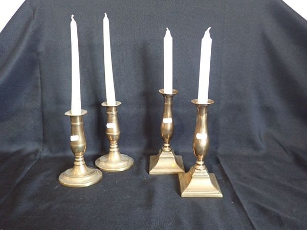 TWO PAIRS OF 18TH CENTURY BELL METAL CANDLESTICKS