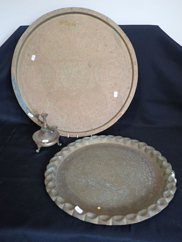 AN EGYPTIAN ENGRAVED COPPER CIRCULAR TRAY