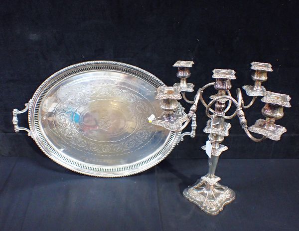 A SILVER PLATED TWO HANDLE OVAL TRAY