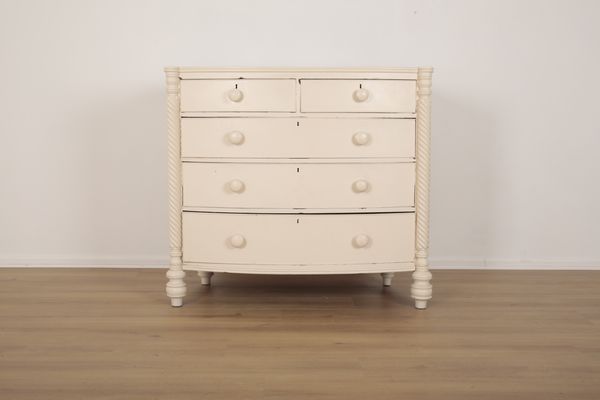 A VICTORIAN WHITE-PAINTED BOWFRONT CHEST OF DRAWERS