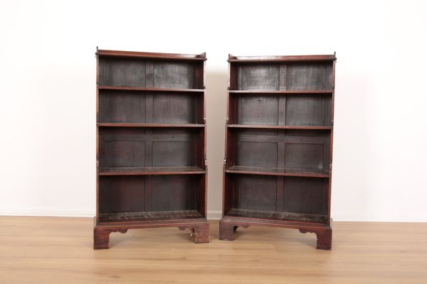 A PAIR OF MAHOGANY WATERFALL BOOKCASES