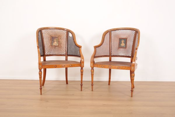 A PAIR OF EARLY 20TH CENTURY FRENCH PAINTED SATIN BIRCH ARMCHAIRS