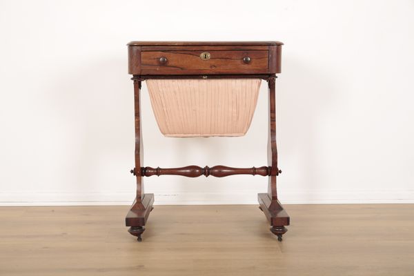A WILLIAM IV ROSEWOOD SEWING TABLE