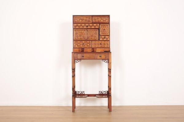 A JAPANESE MARQUETRY CHEST ON STAND