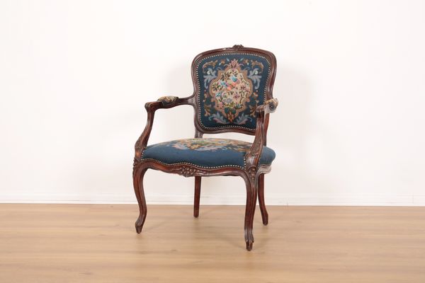 A GEORGE III STYLE ARMCHAIR OF FRENCH HEPPLEWHITE DESIGN