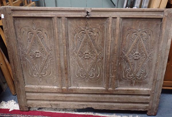 AN 18TH CENTURY CARVED OAK PANEL