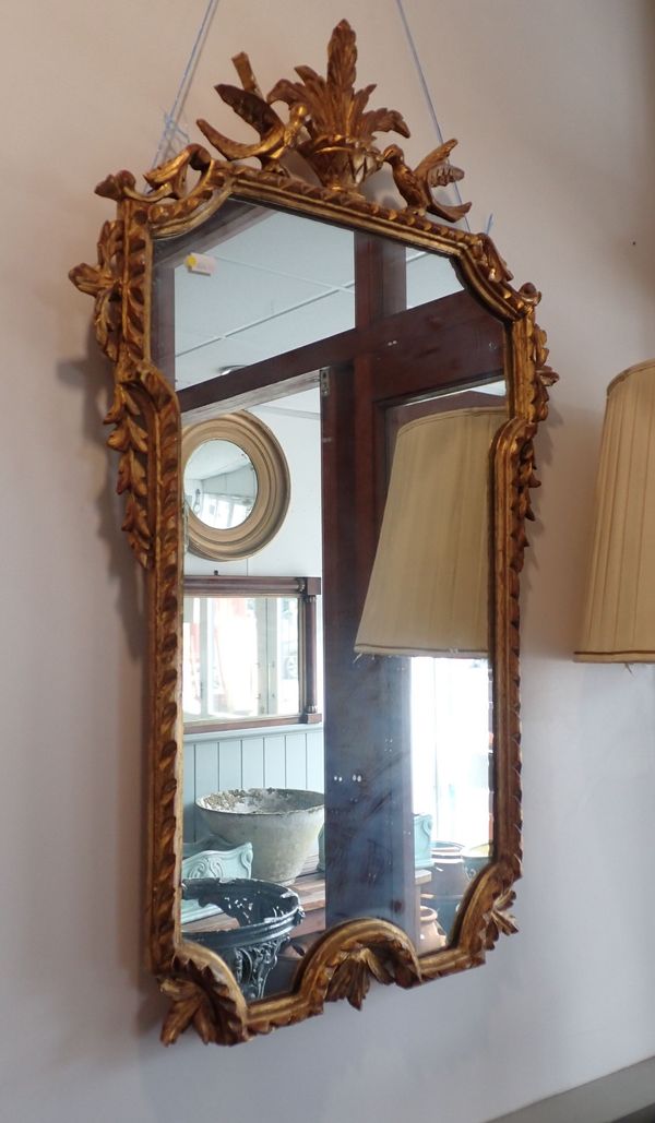 AN ITALIAN GILTWOOD WALL MIRROR