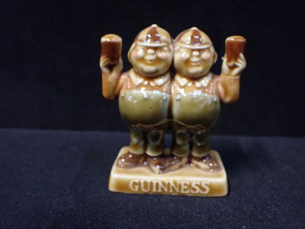 A GUINESS ADVERTISING FIGURINE