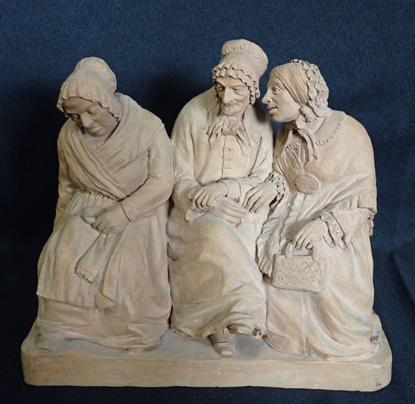 A TERRACOTTA GROUP OF THREE LADIES