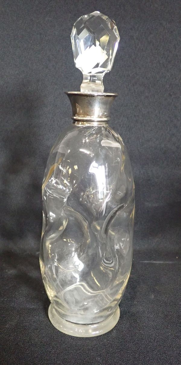 A SILVER COLLARED DECANTER