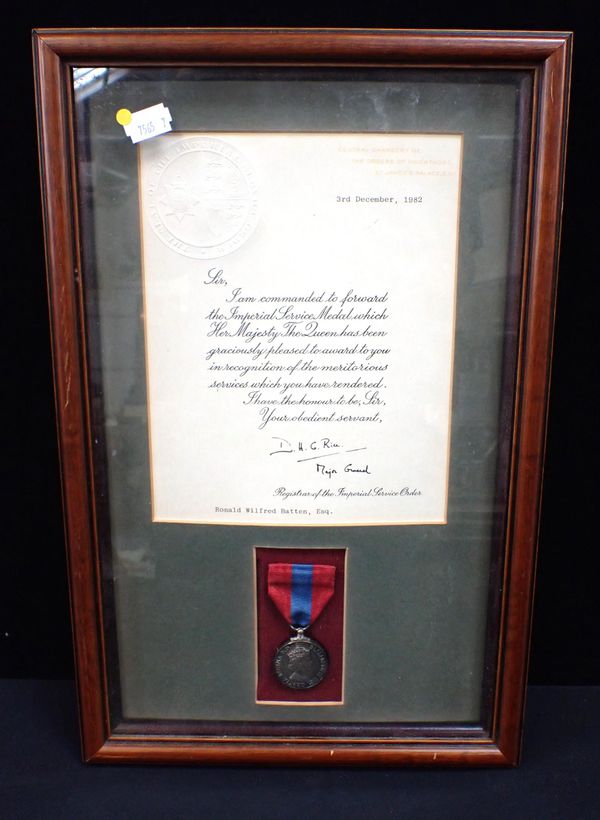 AN IMPERIAL SERVICE MEDAL, AWARDED TO RONALD WILFRED BATTEN