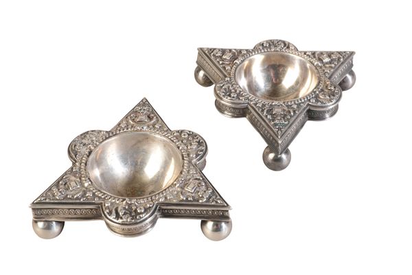 A PAIR OF SILVER PLATE TRIANGULAR SALTS