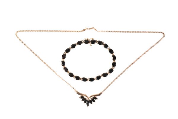 A BLACK DIAMOND BRACELET AND PENDANT NECKLACE SUITE