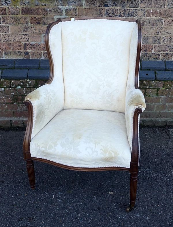 A 19TH CENTURY MAHOGANY WINGBACK ARMCHAIR